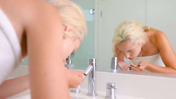 Woman Washing Face Slow Motion