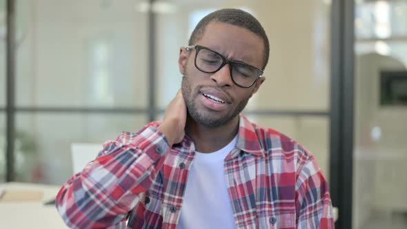 Portrait of African Man Having Neck Pain