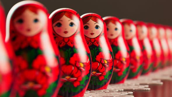 Beautiful matryoshka dolls in a row. An infinite number of babushkas on a doily.