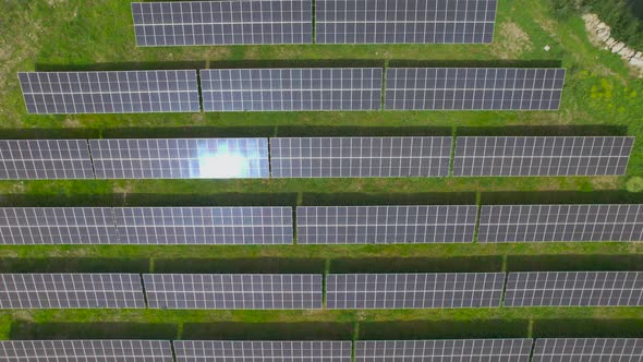 Solar Panels Factory at Sunlight Close-up Aerial View