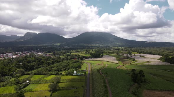 4k aerial hyper lapse of Arenal volcano near La Fortuna, Costa Rica. Drone approaching the iconic la