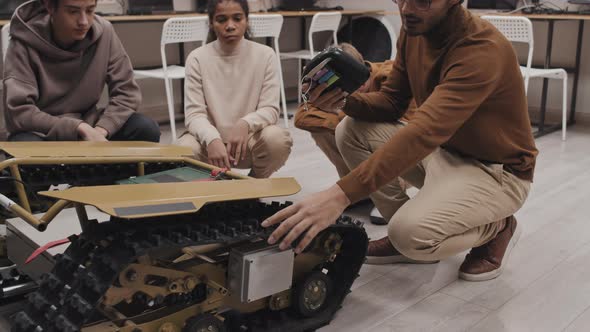 Demonstrating Robotic Machine At Class alt