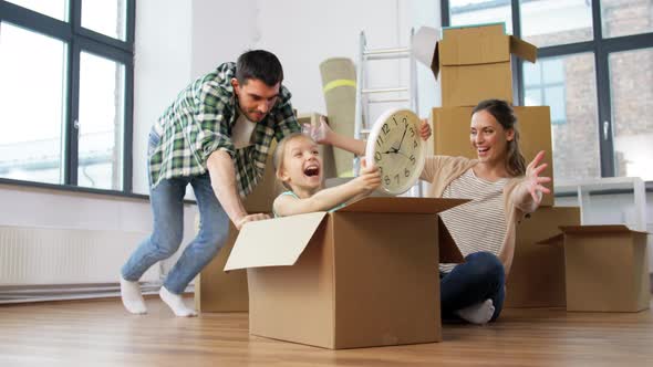 Happy Family with Child Moving To New Home