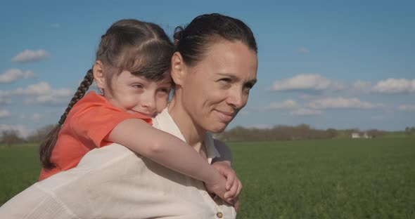 The Child Hugs Mom