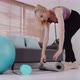 Young Asian beautiful fit sport woman rolling out yoga mat prepare to work out by exercise. - VideoHive Item for Sale