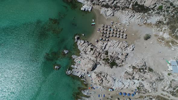 Piperi beach in Naoussa on Paros island in the Cyclades in Greece aerial view