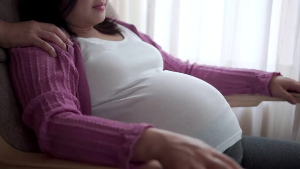 Pregnant Couple Feels Love and Relax at Home