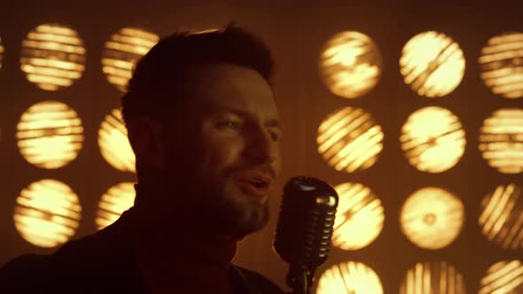 Man Vocalist Performing Song in Nightclub Close Up