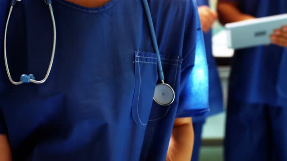 Portrait of female surgeon in surgical mask