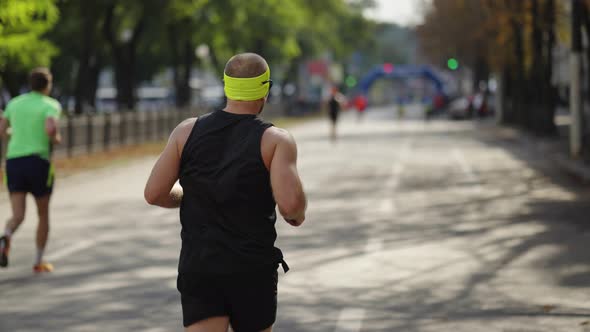 Marathon Runner Approaching Finish Line