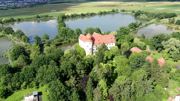 Aerial view of Water Castle Neuhaus, Adelsdorf, Bavaria, Germany