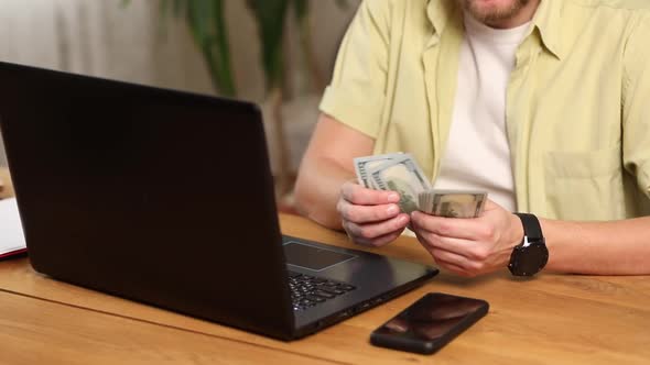 Businessman hands counting cash american dollars banknotes