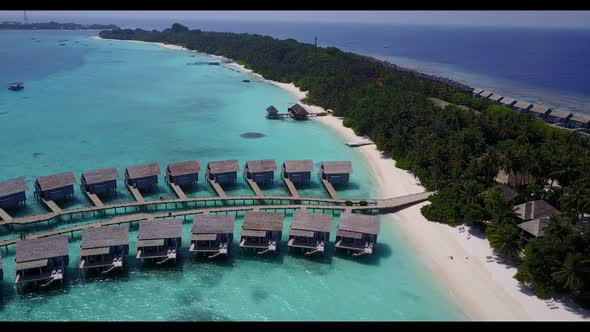 Aerial flying over abstract of paradise lagoon beach break by aqua blue ocean with clean sand backgr