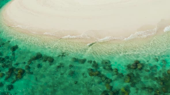 Tropical Beach and Blue Sea with Waves