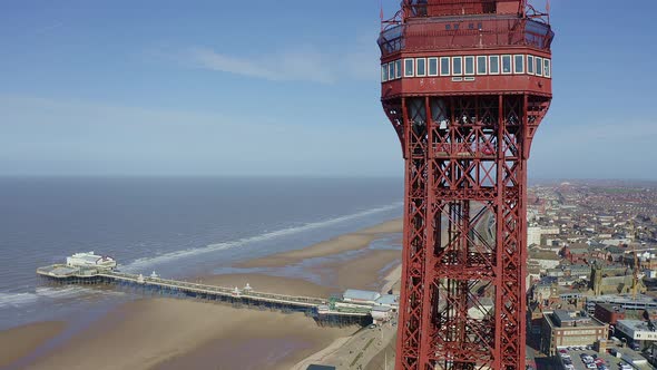 Aerial footage, drone view , of the famous Blackpool Tower and beach from the sky on a beautiful Sum