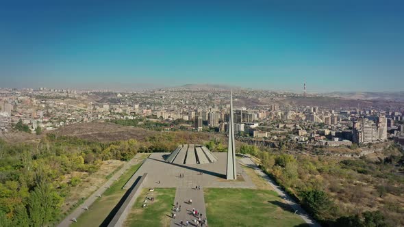 Aerial Drone Zoom in Shot of Tsitsernakaberd Museum and City Panorama