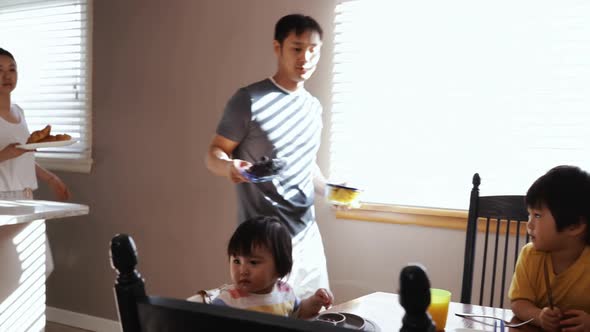 Family enjoying time relaxing together at home