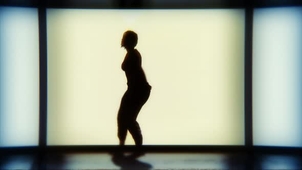 Silhouette Of A Dancing Hip Hop