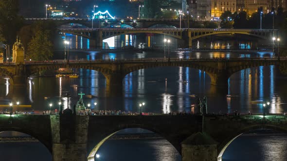 Aerial Night View of the Vltava River and Illuminated Bridges Timelapse Prague