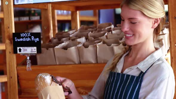 Female staff holding parcel