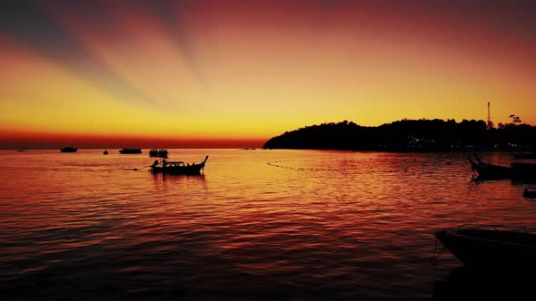 The Silhouette of One Boat in the Andaman Sea During the Sunset