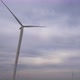 Working wind turbines in field, environmentally friendly renewable energy. - VideoHive Item for Sale