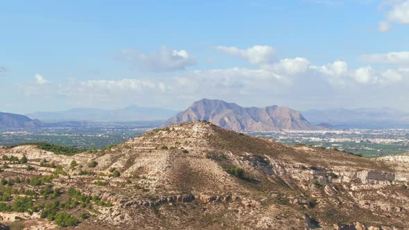 Mediterranean Desert Hill With Mountain In Background Near Algorfa, Spain.