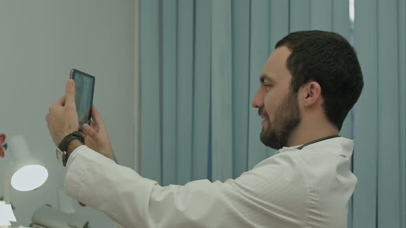 Male Doctor Taking Selfie Smiling