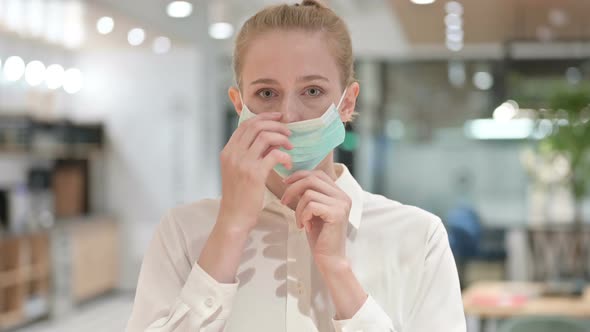 Portrait of Young Businesswoman Wearing Protective Face Mask 