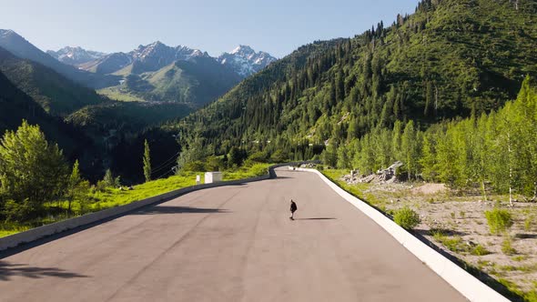 Skatebording at Longboard in the Mountain Road