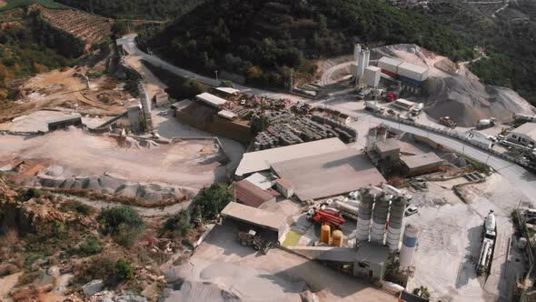 Concrete cement plant with production area. Industrial factory facilities.