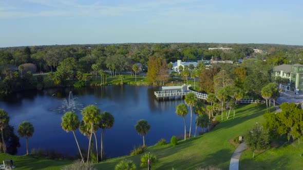 Flying Over a Fountain in a Pond in a Small Town in Florida