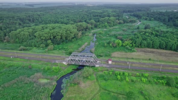 Metal Railway Train Bridge Over the River