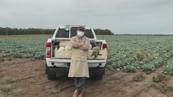 Man Against Pickup Truck