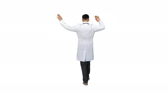 Handsome Doctor Man Wearing Medical Uniform Dancing on White Background.