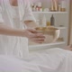 Massage Takes Singing Bowl for Sound Therapy and Puts on Back Lying Woman - VideoHive Item for Sale
