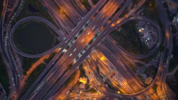 4K UHD : Aerial of drone flight over highway at night rush hour traffic