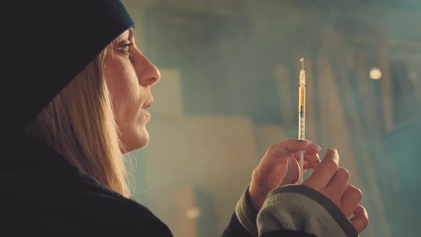 Junkie Woman with syringe