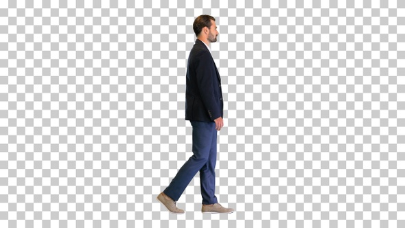 Fashionable businessman in a suit walking slowly, Alpha Channel