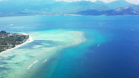 Indonesia,tropical islands, mountain range and perfectly clear seawater, aerial seascape