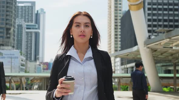 Asian young smart business woman working in company office in city with confidence and smile.