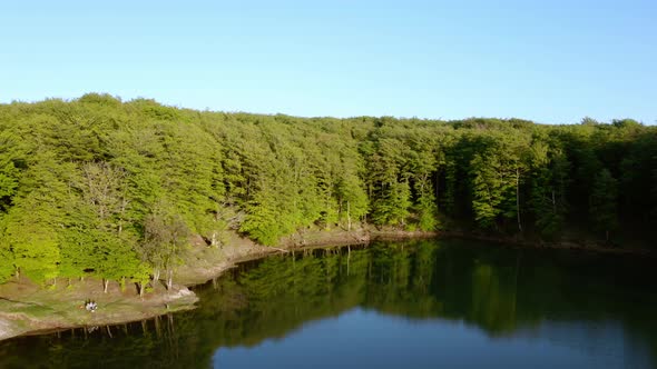 Aerial view of mountain lake at sunset