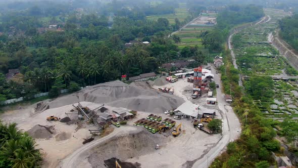 Aerial view of machines work in sand processing facility in Muntilan, Indonesia