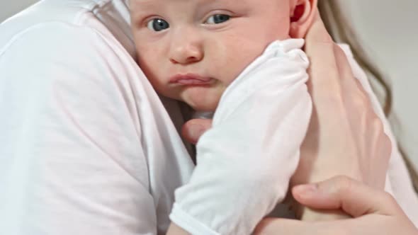 Woman Rocking Baby