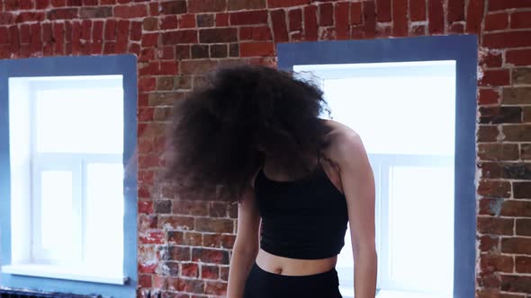 Young Woman Dancer Warming Up Before Dancing