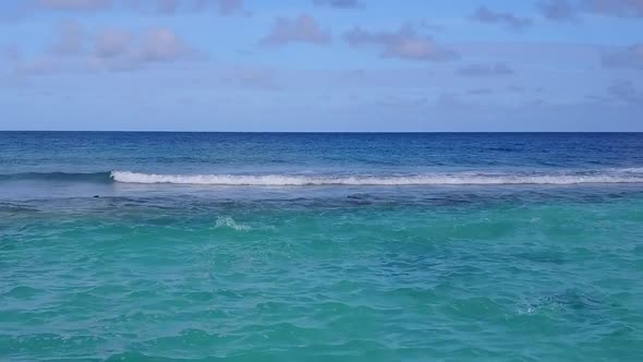 Aerial abstract of marine island beach voyage by blue lagoon with sand background