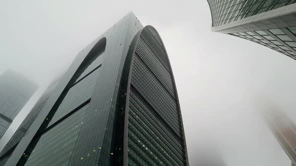 Skyscrapers in the Mist of Clouds