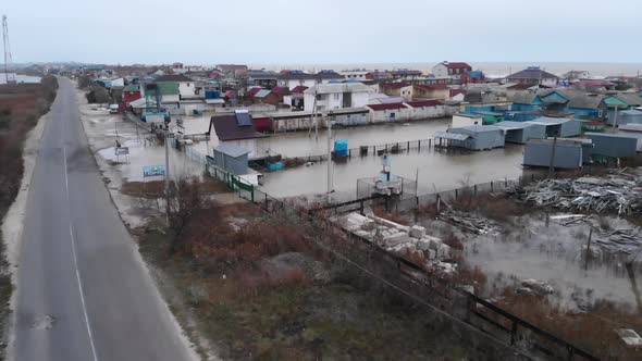 Flood in a Settlement Near the Sea