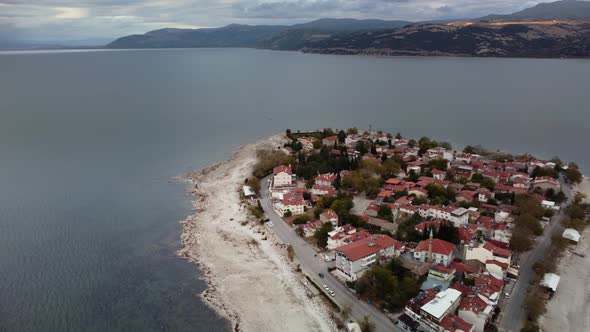 Drone Landscape of Green Island in Isparta Egirdir Lake Filmed at Cloudy Summer Day