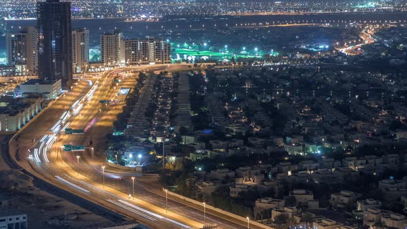 Aerial View of Apartment Houses and Villas in Dubai City Night Timelapse United Arab Emirates